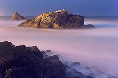 photo "Rock by the sea at night"