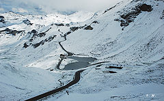 photo "Lake in Alps. Photo through the bus window."