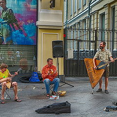 photo "A street concert with tambourine and two balalaikas"